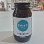 Bottle of Viridian Extra C supplement on a white surface with a blurred background
