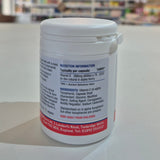 Supplement container with nutrition information label on a blurred background
