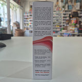 HEMA-PLEX liquid iron supplement box on a counter with a blurred store background