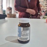 Bottle with a label on a table in a store setting