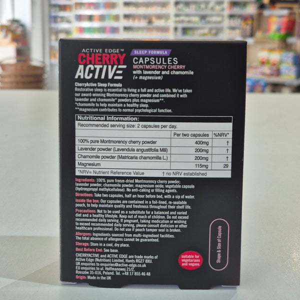Box of Cherry Active capsules with a blurred indoor background