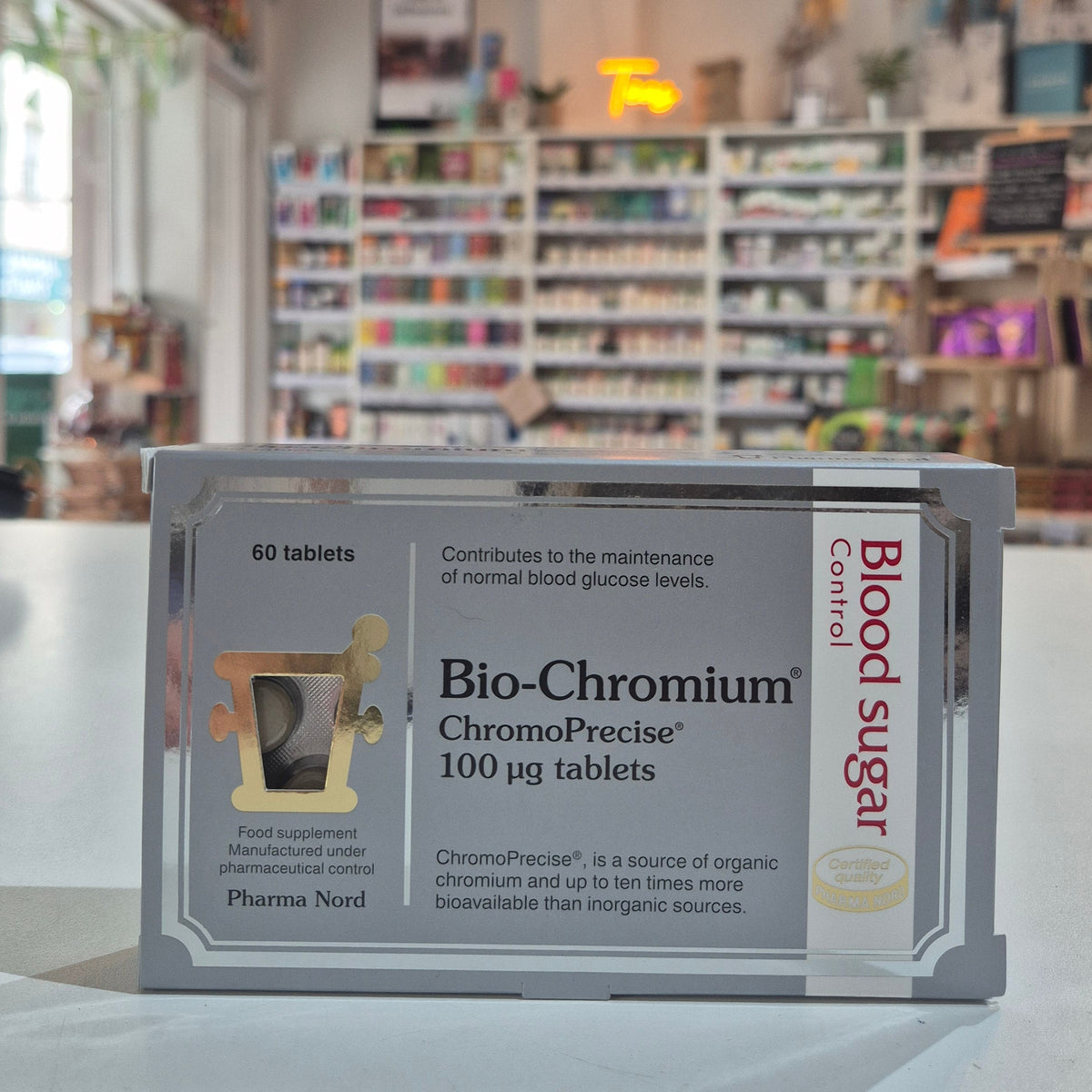 Box of Bio-Chromium ChromoPrecise tablets on a counter in a store.