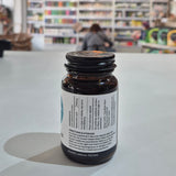 Bottle with a label on a counter in a store setting