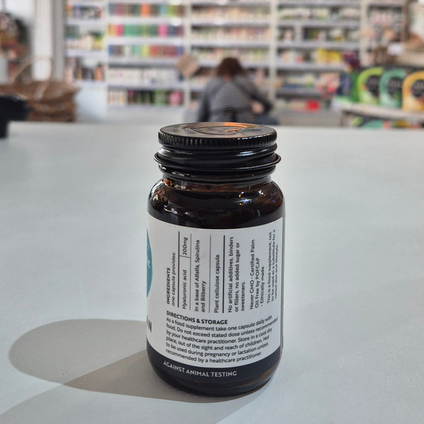 Bottle with a label on a counter in a store setting