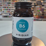 Jar of Viridian High Six B6 B Complex supplement on a counter with a blurred store background
