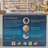 Product packaging with text and images on a blurred store background