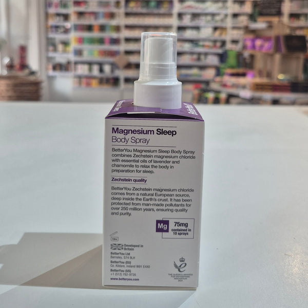 Magnesium Sleep Body Spray packaging with a blurred store background