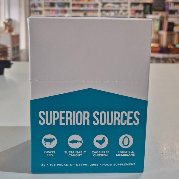 Superior Sources food supplement package on a table with a blurred store background