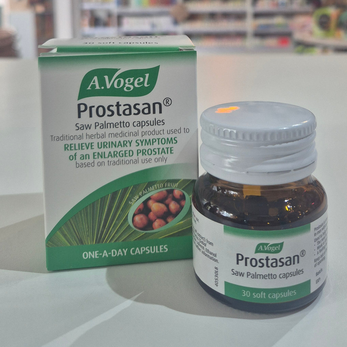 A Vogel Prostasan capsules packaging and bottle on a table