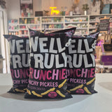 A bag of Well & Truly Crunchies Crunchy Pickles snack chips 3 packs
