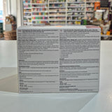 Supplement box with text on a blurred store shelf background