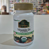 Nature's Plus Vitamin D3 supplement bottle on a white surface with a blurred background
