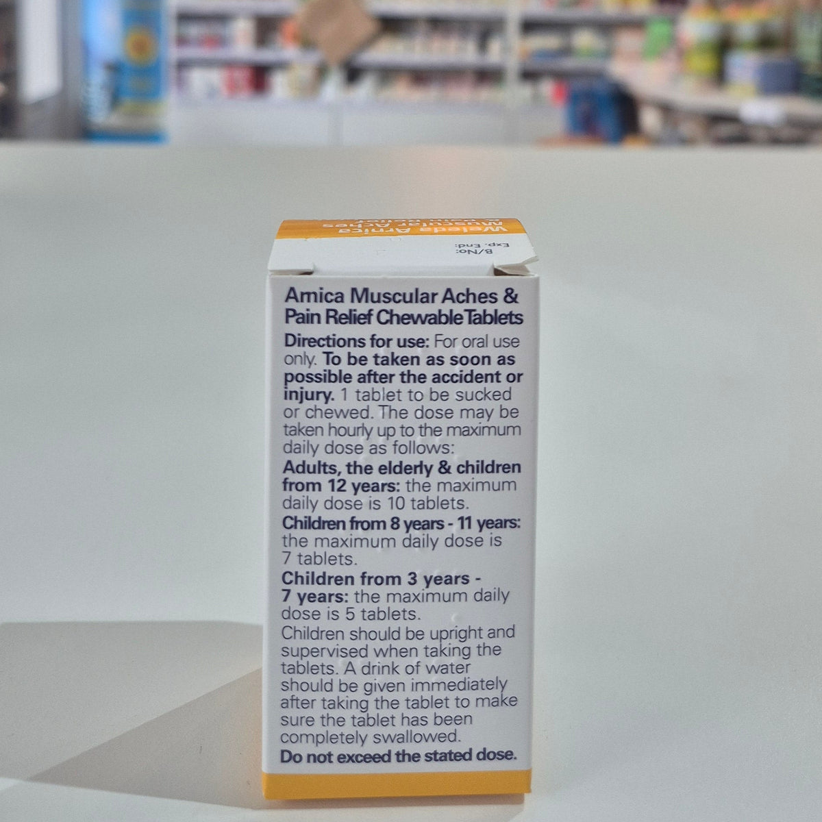 Arnica back of the box, white and yellow