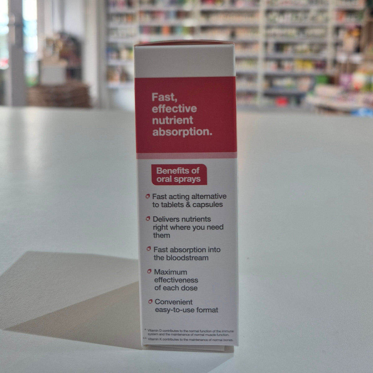 Product packaging with text on a blurred background of shelves