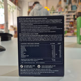Nutritional supplement box. Box of New Nordic Magic Magnesium Glycinate 600 mg supplement on a blurred store shelf background