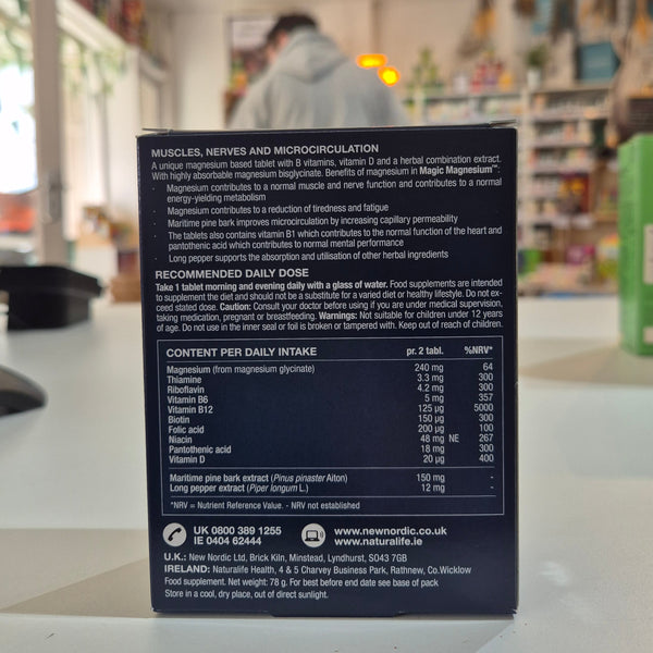 Nutritional supplement box. Box of New Nordic Magic Magnesium Glycinate 600 mg supplement on a blurred store shelf background