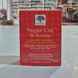 'Sugar Cut Berberine' held against a blurred bookstore background