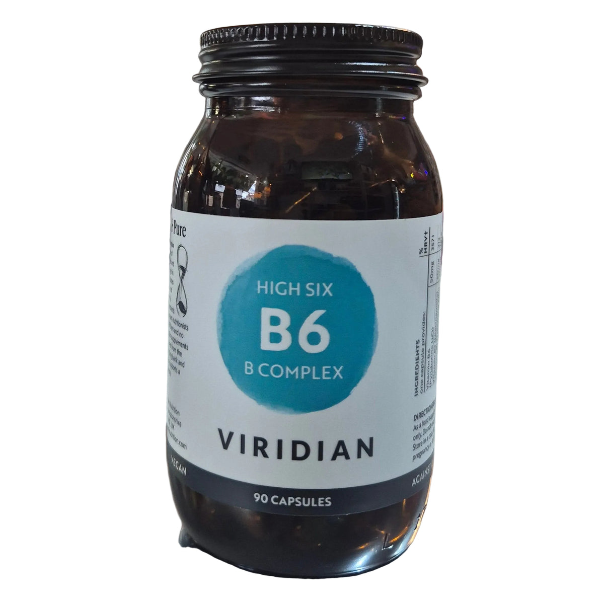 Jar of Viridian High Six B6 B-Complex supplement on a counter with a blurred store background.