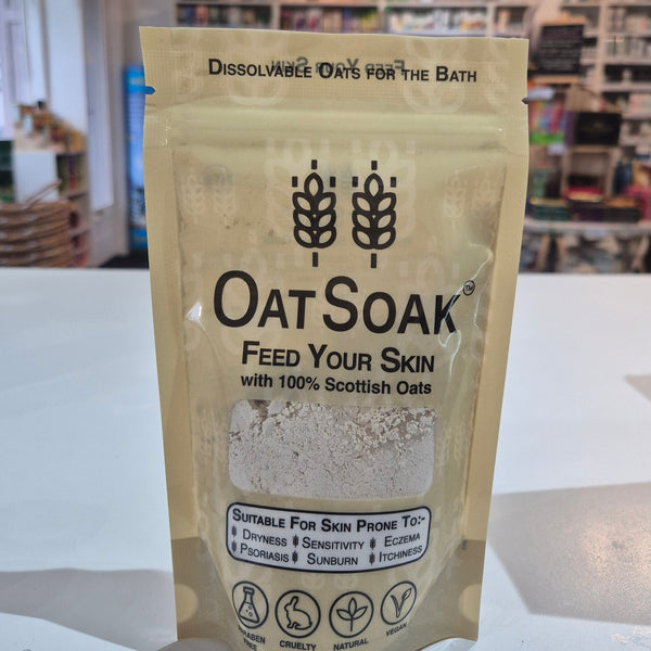OatSoak package with a blurred indoor background