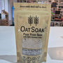 OatSoak package with a blurred indoor background