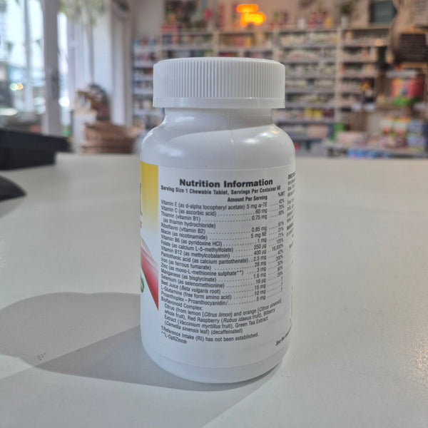 Supplement bottle with nutrition information label on a counter in a store setting