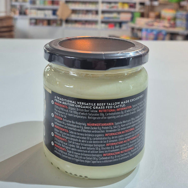 Jar of cream with a blurred store interior in the background