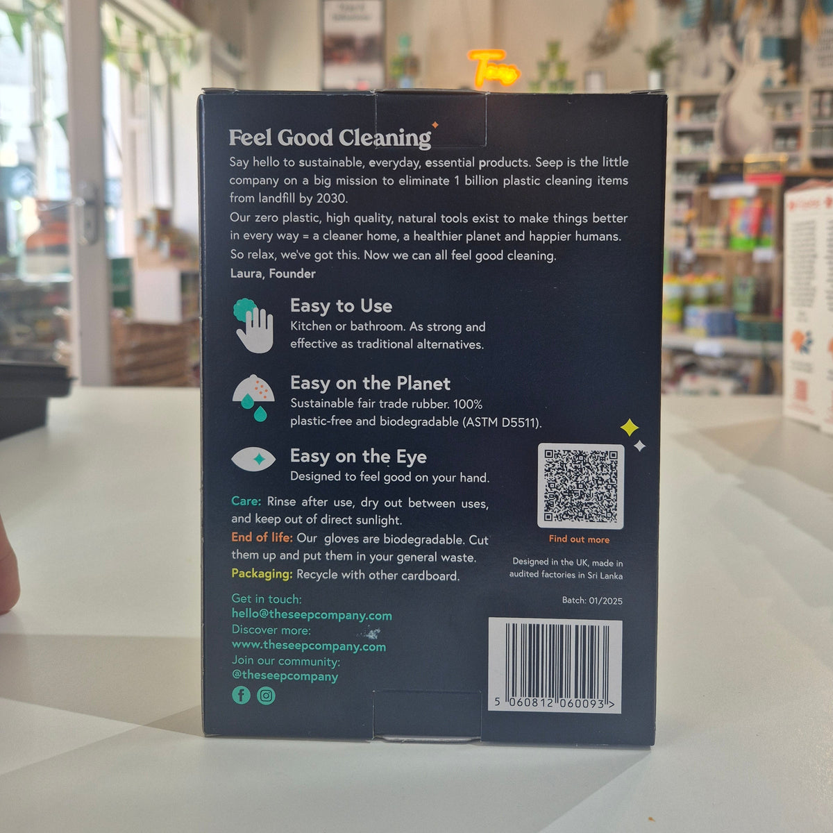 Rubber Gloves with QR code and text in a bookstore setting