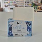 Bio-D laundry bar and packaging on a shelf with blurred store background