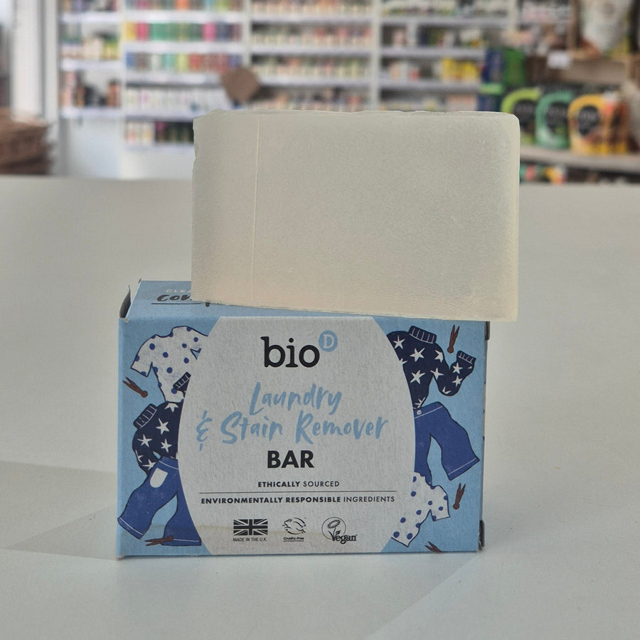 Bio-D laundry bar and packaging on a shelf with blurred store background