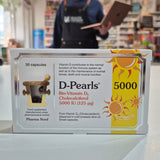D-Pearls Vitamin D3 supplement packaging on a shelf in a store.