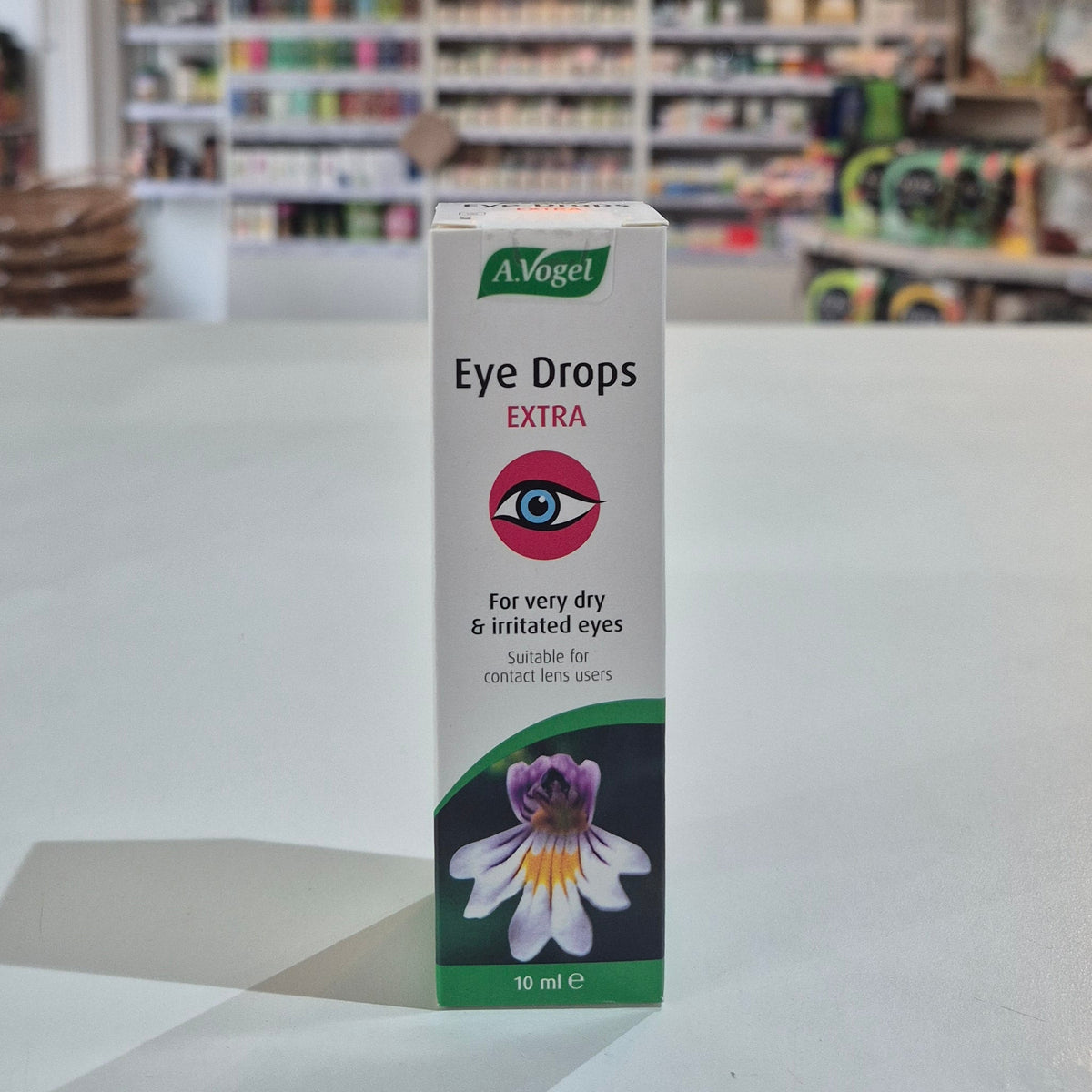 A.Vogel Eye Drops Extra packaging on a table with a blurred store background
