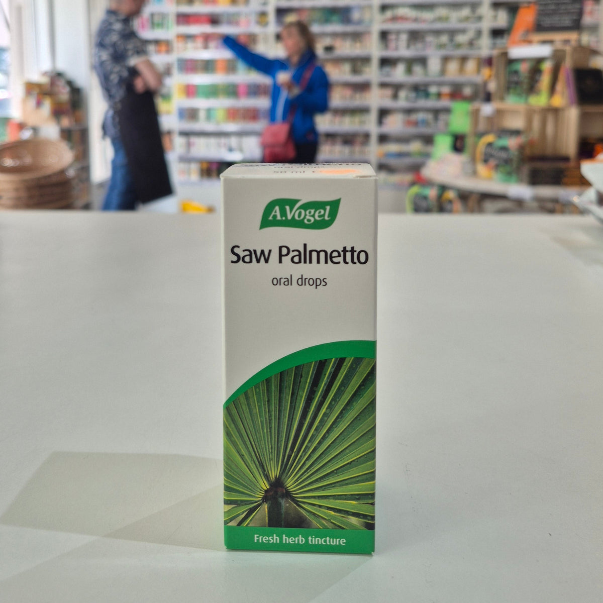 A.Vogel Saw Palmetto oral drops packaging on a counter with a store background