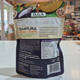 Packaging of DJ&A Tempura Veggie Crisps with ingredients and nutrition information on a blurred background.