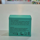 Green box with text and icons on a white surface