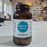 Bottle of Viridian Magnesium Taurate on a counter in a store setting