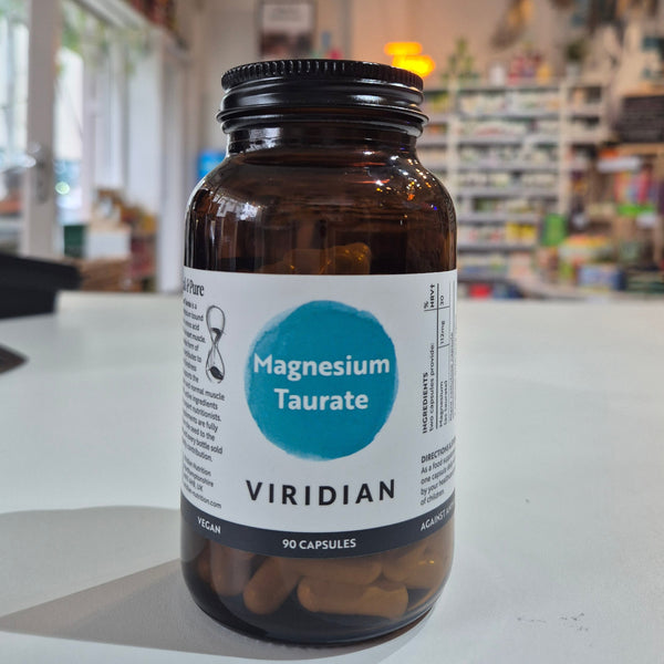 Bottle of Viridian Magnesium Taurate on a counter in a store setting