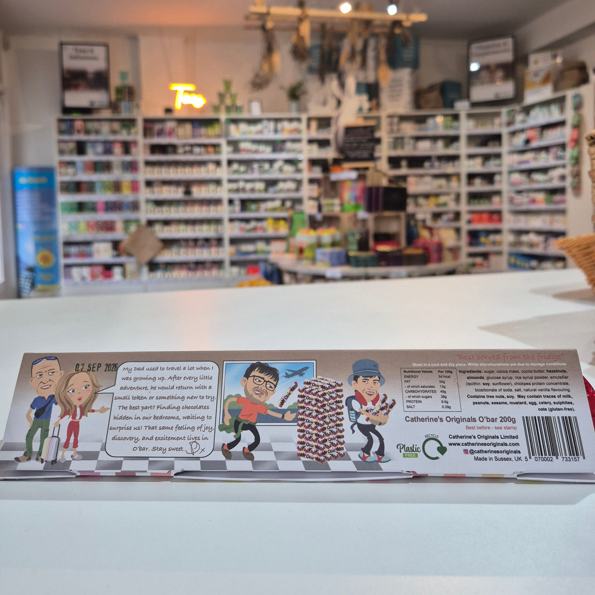 Product packaging with cartoon characters on a blurred background of shelves.