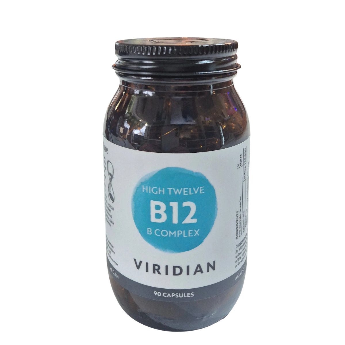 Jar of Viridian High Twelve B12 B-Complex supplement on a white surface with a blurred store background.