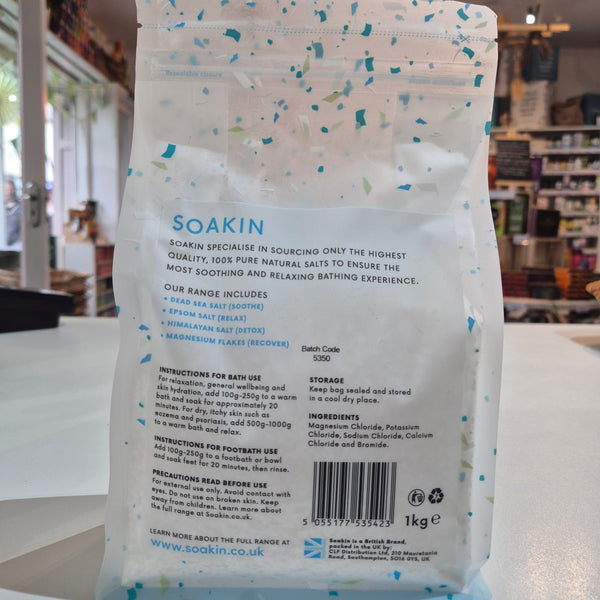 Back view of a Soakin packaging with text and branding details.